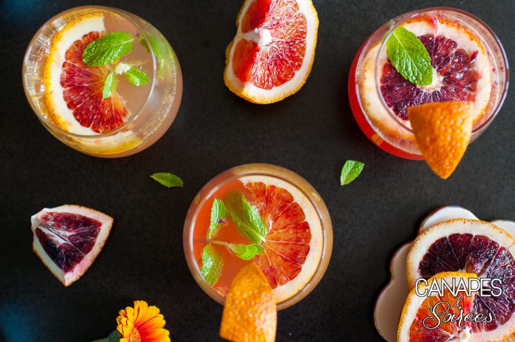 Three blood orange mimosas